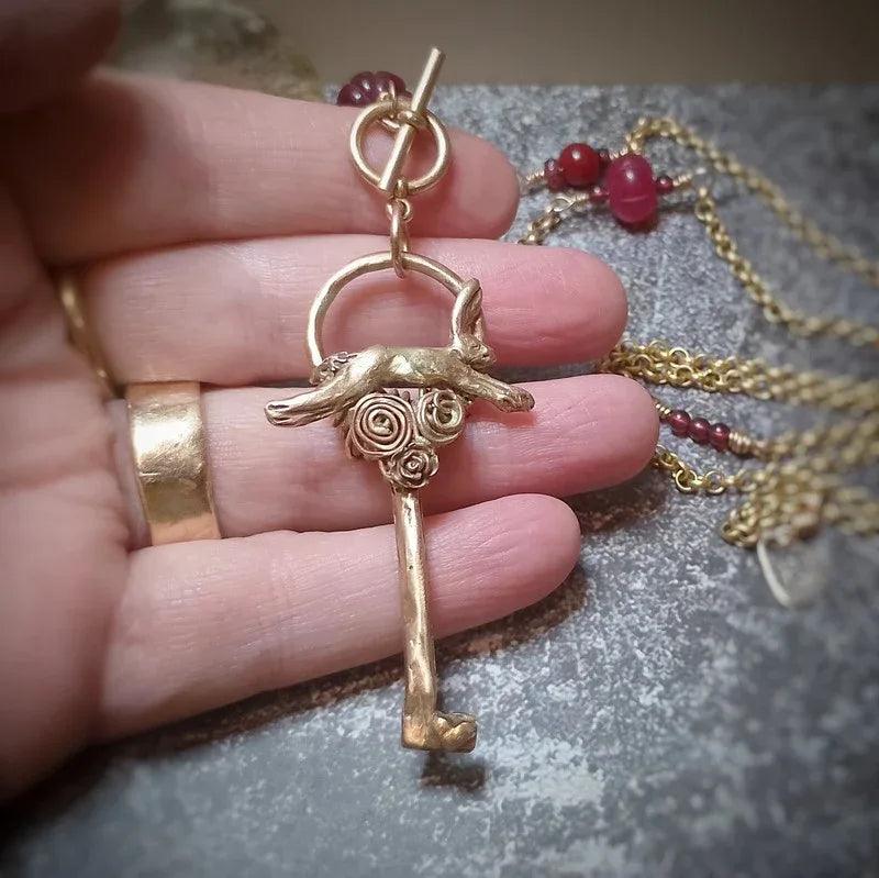 Stunning Running Hare Key Necklace - Elizabeth's Boutique