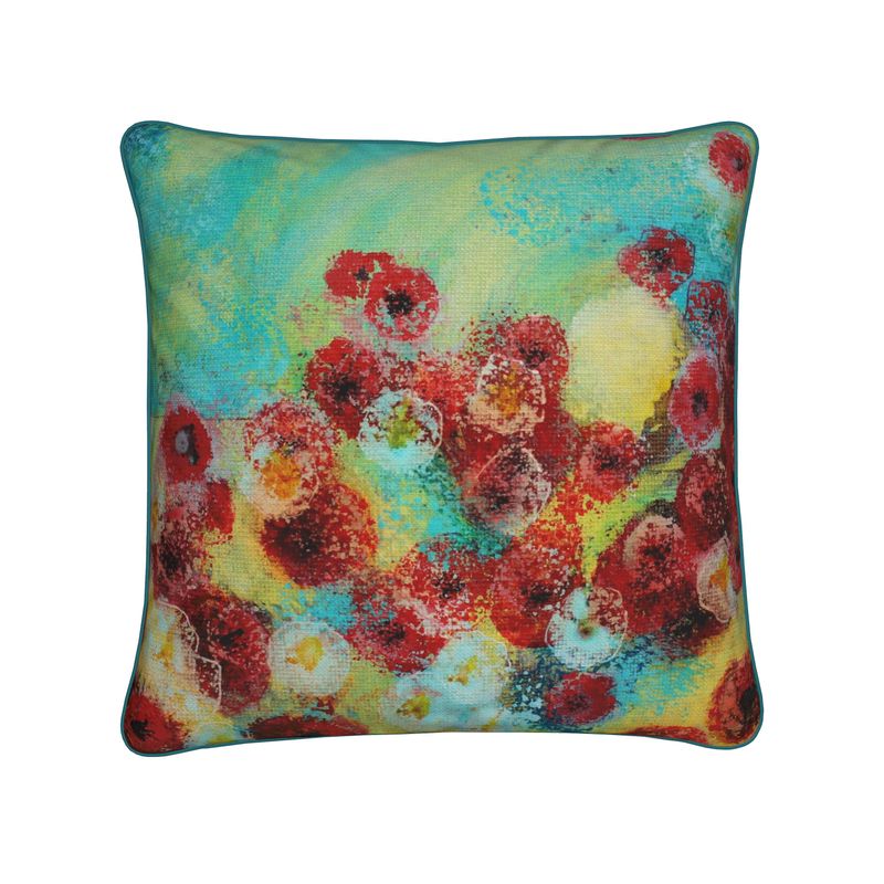 Decorative pillow with a colorful floral pattern on a white background