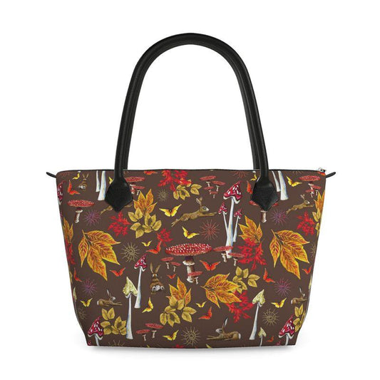 handbag handmade to order tote bag with leather straps with autumn leaf butterfly and hare rabbit mushroom pattern on a white background