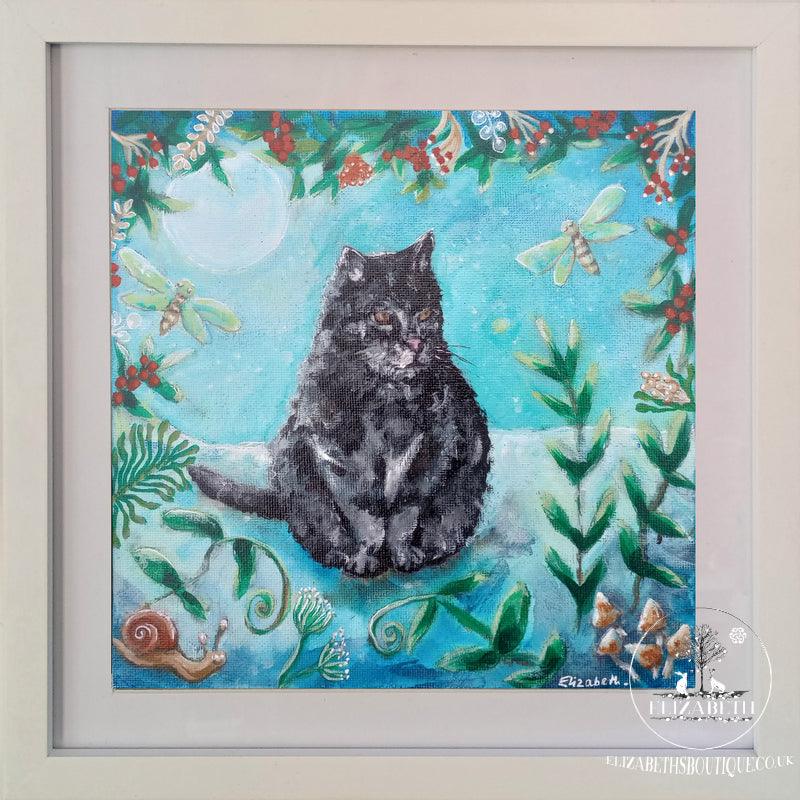 Framed artwork of a black cat surrounded by nature elements on a blue background.