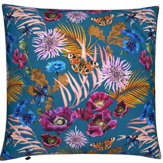 Decorative pillow with floral and butterfly pattern on a blue background