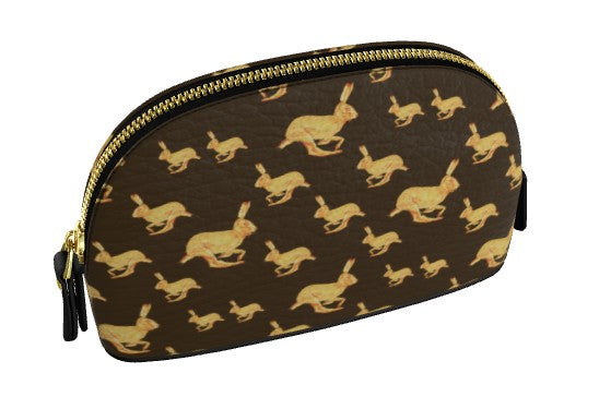 Cosmetic bag with gold rabbit pattern on brown background
