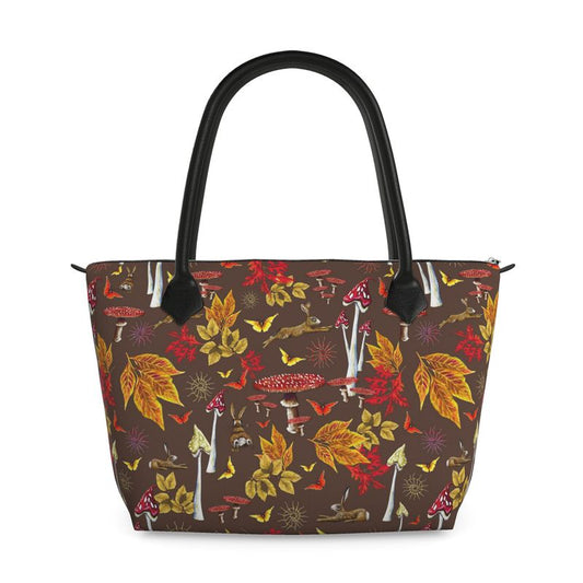handbag handmade to order tote bag with leather straps with autumn leaf butterfly and hare rabbit mushroom pattern on a white background