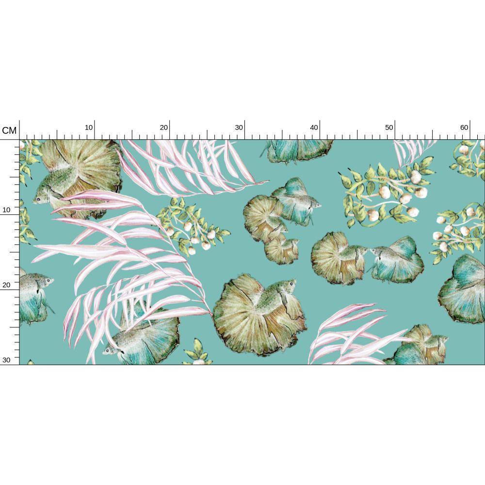 close up of wallpaper with tropical leaf pattern on a teal background, featuring a ruler for scale.