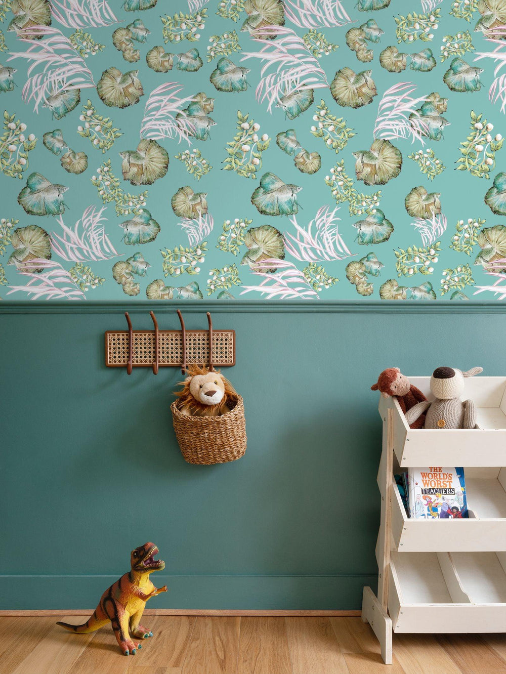 Children's room with teal fish scene walls, dinosaur toy, and storage unit.