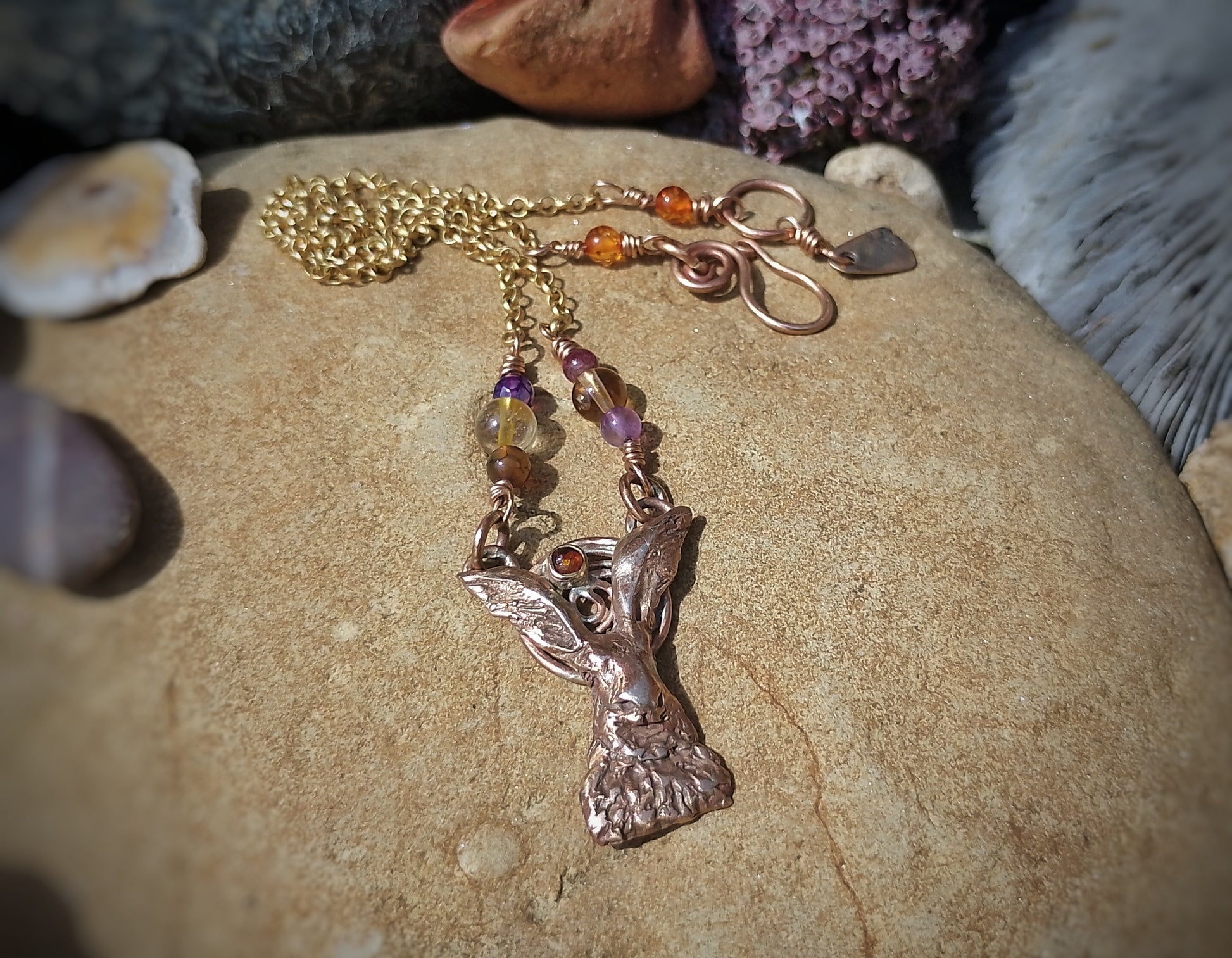 Elizabeth's Boutique
The Amber Hare Nature Energy Necklace
