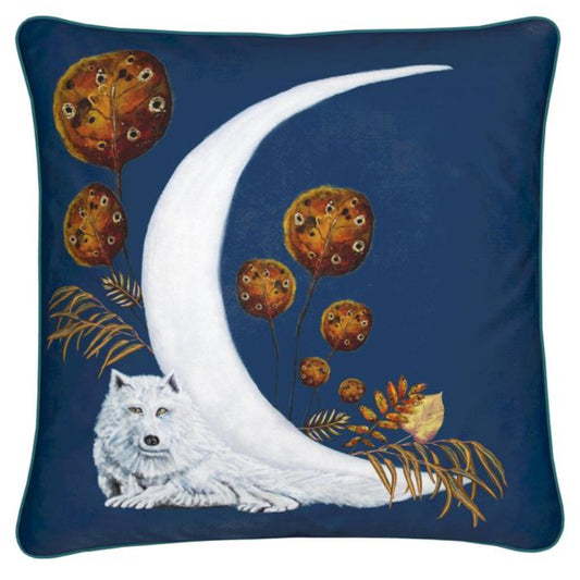 Decorative pillow with a wolf and moon design on a blue background